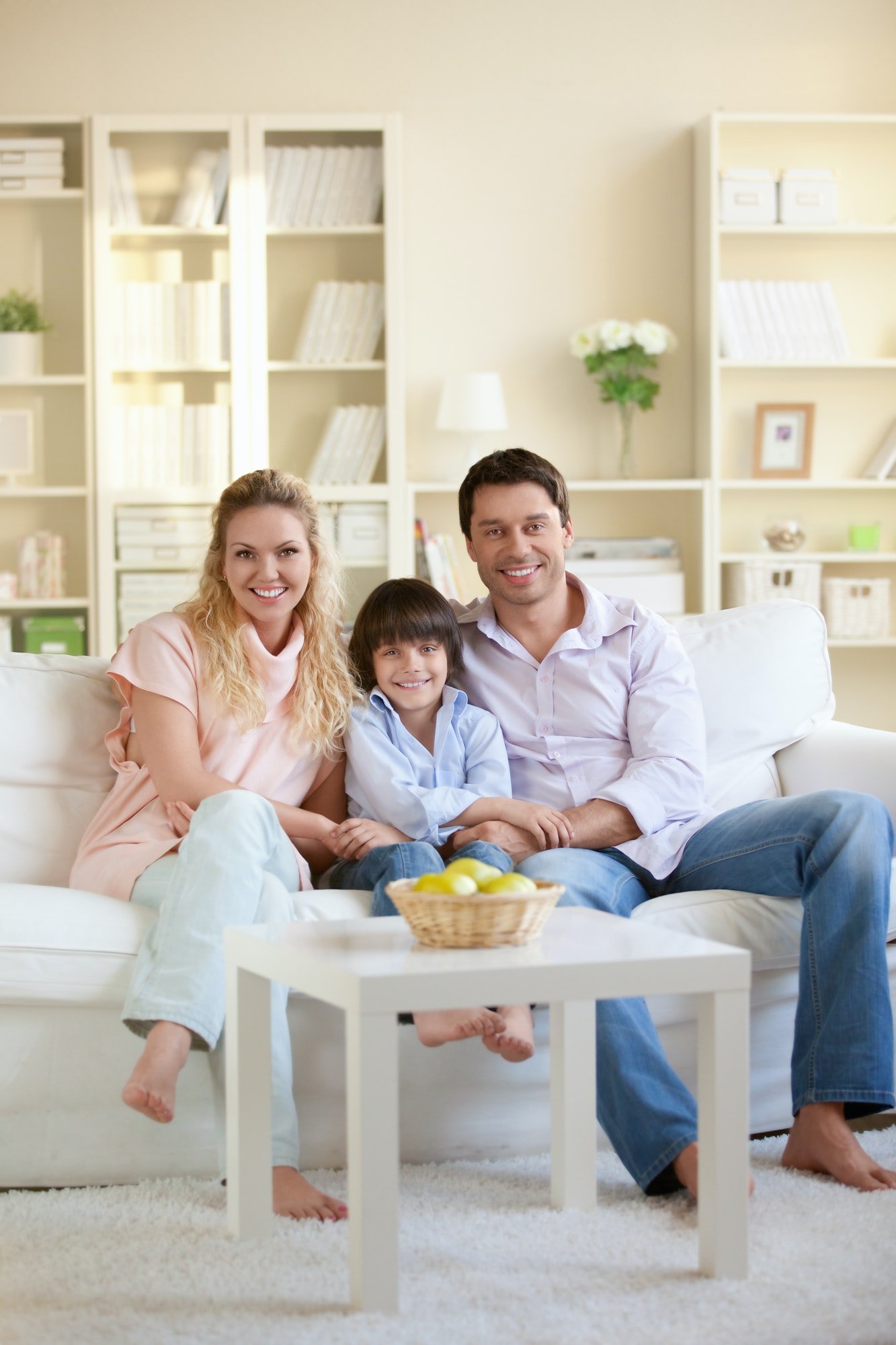 Smiling family with children at home