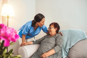 caregiver helping out a patient